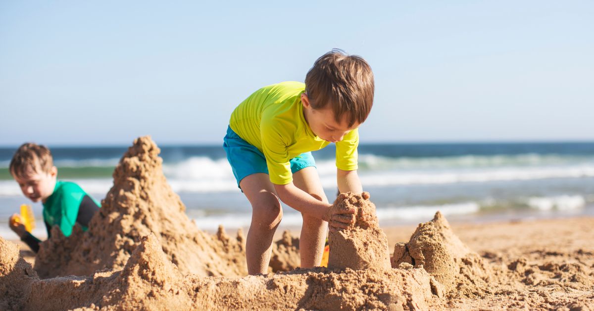 Little kids building sand castles