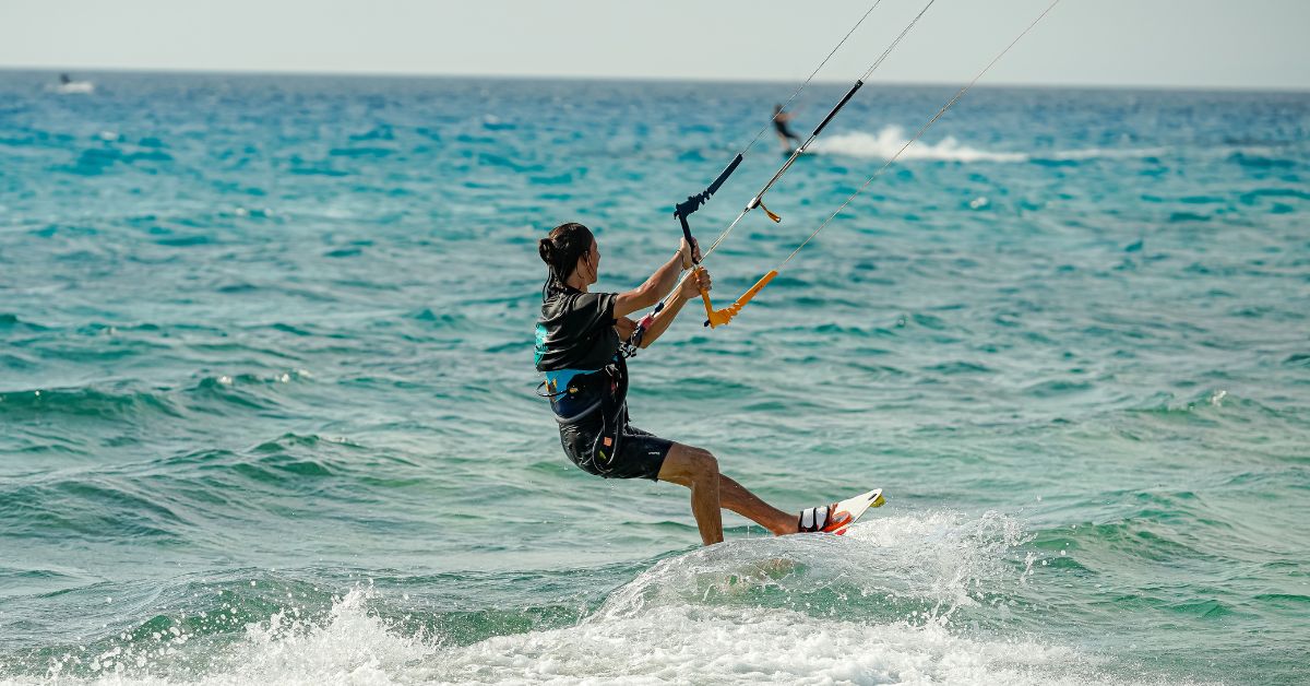 langebaan kitesurfing - Lady kiteboarding on the ocean