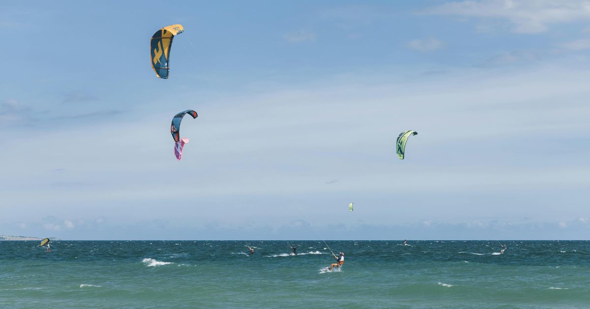 People in langebaan kitesurfing