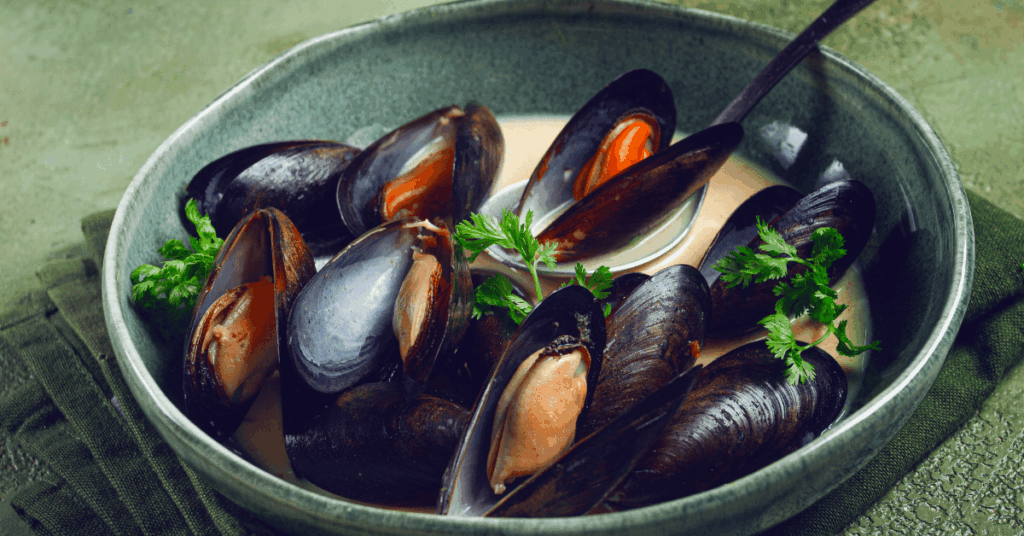 Easting mussels at a restaurant on the west coast