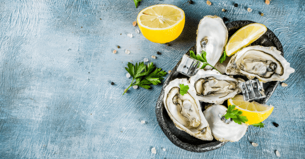 Eating oysters with lemon at West Coast restaurants