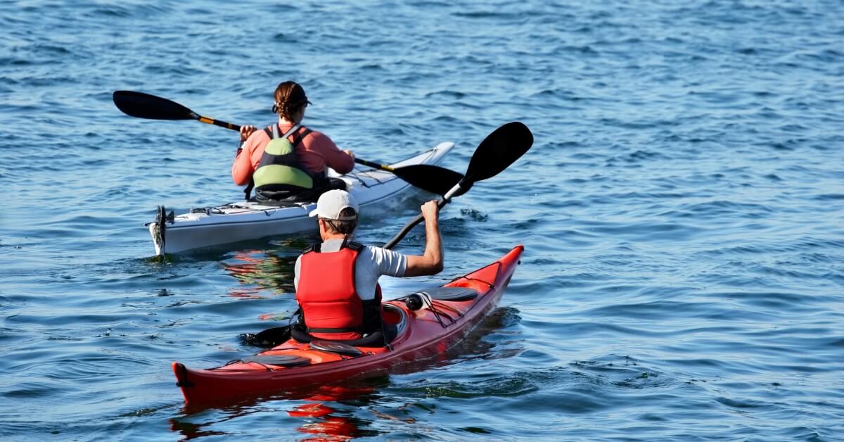 Two People Kayaking on the ocean