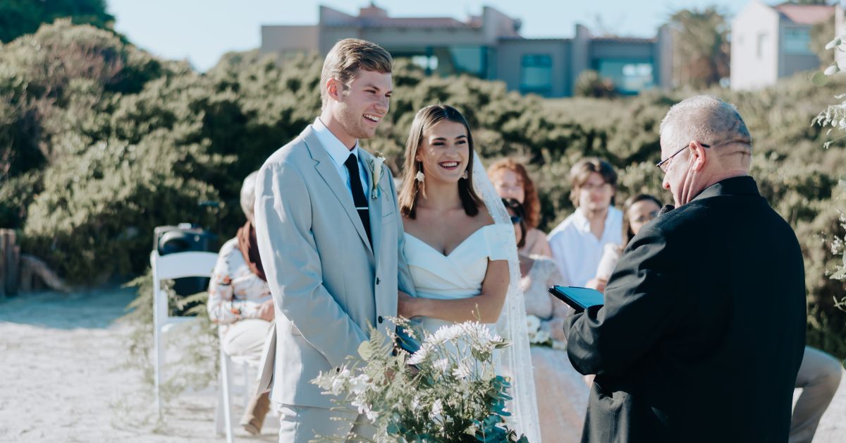 Couple getting married outdoors at Blue Bay Lodge